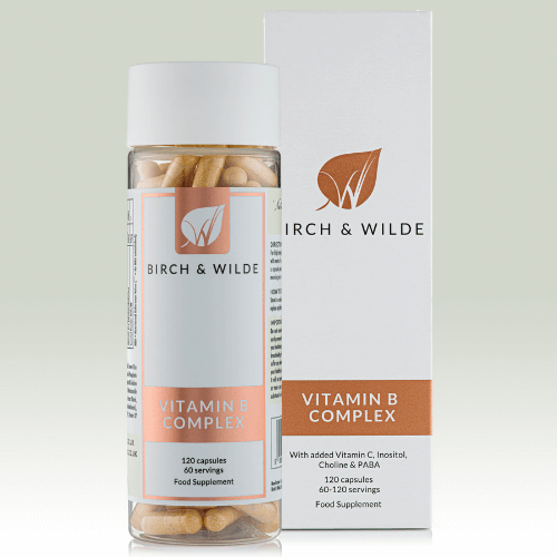  product pack shot from front of Birch & Wilde Vitamin B complex capsules in a bottle with a product box behind it and a plain background