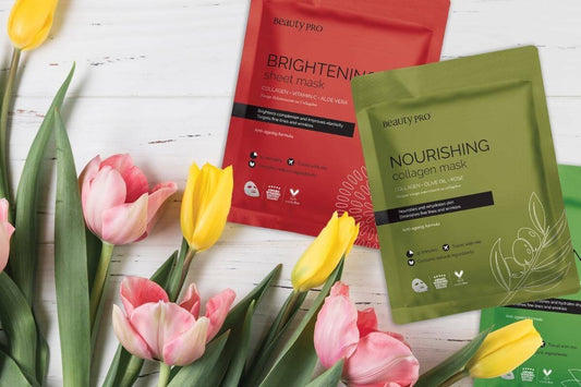 beautypro collagen sheet face masks for birch and wilde blogs laid out on pink and yellow flowers