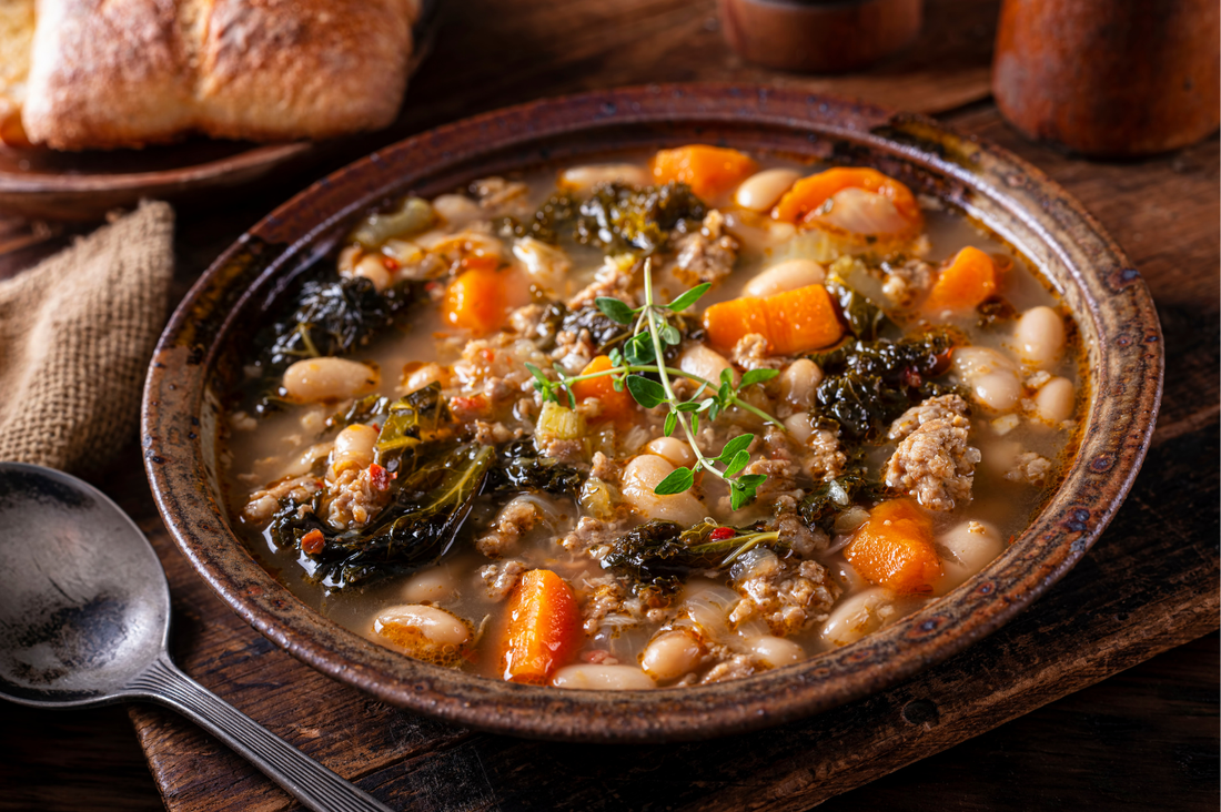 Braised Cavolo Nero and White Bean Stew with Roasted Garlic and Parmesan