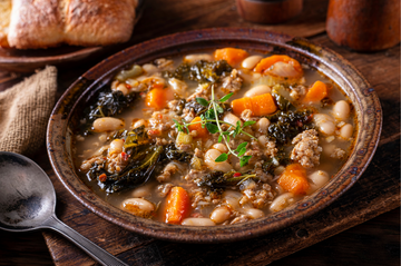 Braised Cavolo Nero and White Bean Stew with Roasted Garlic and Parmesan