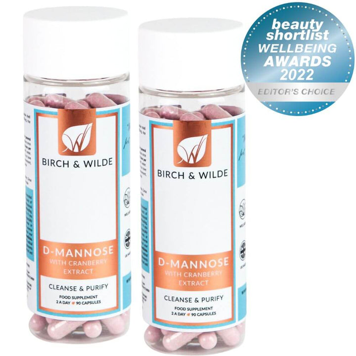 product pack shot from front of 2 bottles of Birch & Wilde D-Mannose with cranberry extract health supplement capsules with a plain background