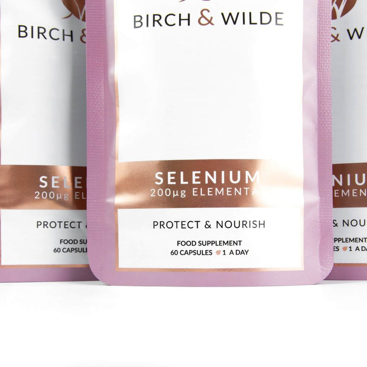 close up product pack shot from front of Birch & Wilde Elemental selenium capsules in a refill pouch with a plain background